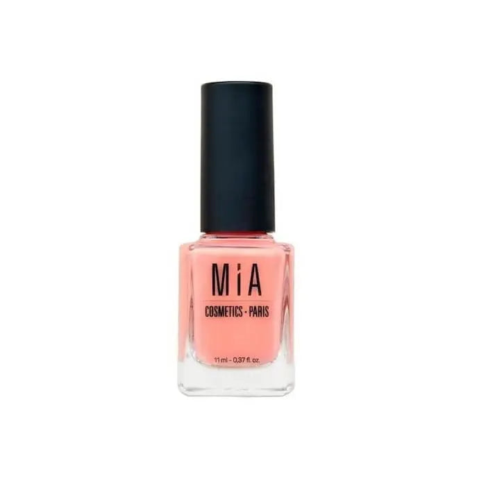 Mía Cosmetics Coral Blush nail polish by Jag Couture London - New York, showing a vibrant coral pink nail color in a sleek bottle.
