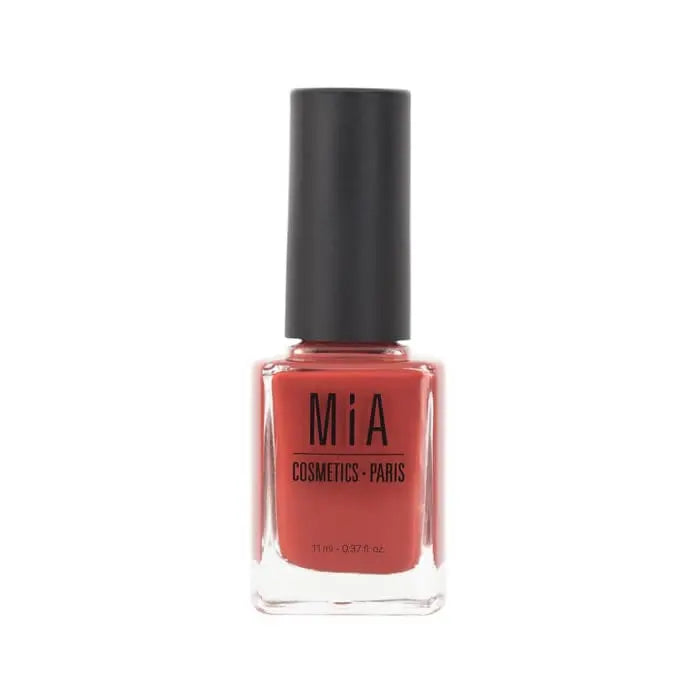Jag Couture London - New York Mía Cosmetics Ginger nail polish bottle with vibrant orange color and sleek design.