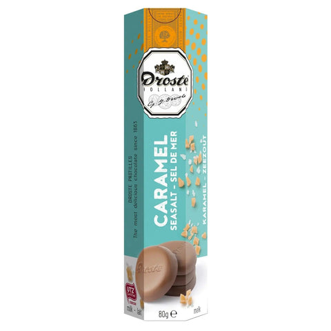 Milk chocolate caramel and sea salt pastilles in a tube by Jag Couture London New York, displayed inside the packaging.