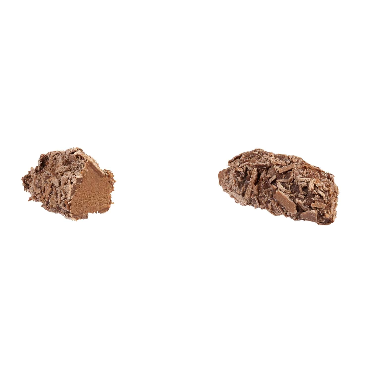 Jag Couture London milk truffle with traditional flaked milk chocolate filling, 13g piece, showcasing creamy filling and textured chocolate exterior.