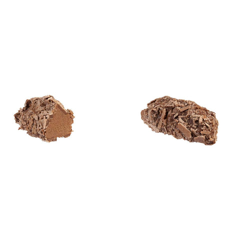 Jag Couture London milk truffle with traditional flaked milk chocolate filling, 13g piece, showcasing creamy filling and textured chocolate exterior.