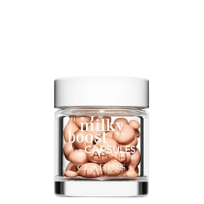 Jag Couture London New York Milky Boost Fond de Teint 3 capsules, close-up view of the skincare product capsules.