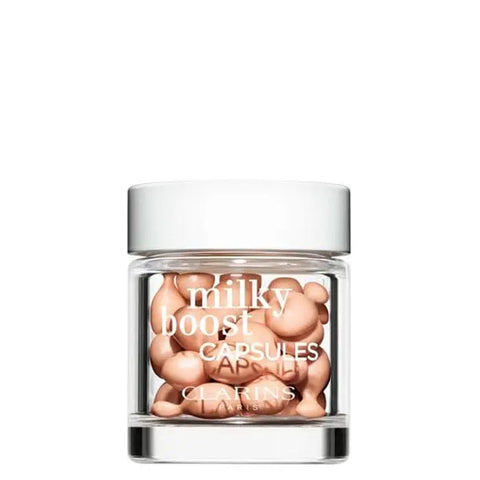 Jag Couture London New York Milky Boost Fond de Teint 3 capsules, close-up view of the skincare product capsules.