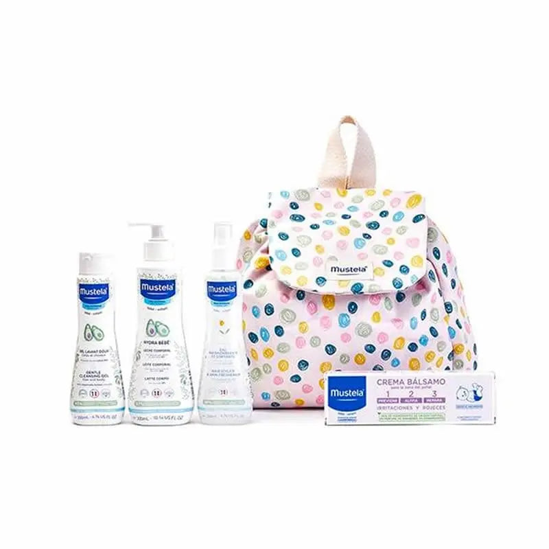 Mustela Little Moments polka dots backpack set by Jag Couture London - New York, showing five colorful, patterned baby accessories.