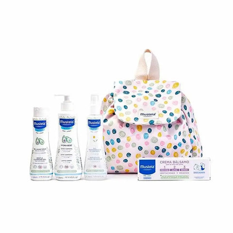 Mustela Little Moments polka dots backpack set by Jag Couture London - New York, showing five colorful, patterned baby accessories.