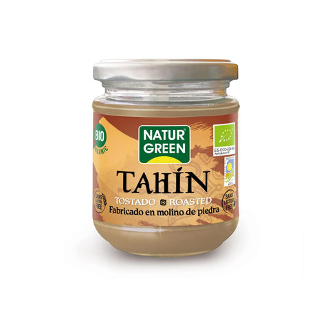 Naturgreen Tahin Tostado 300g jar with creamy sesame paste, displayed on a wooden surface.
