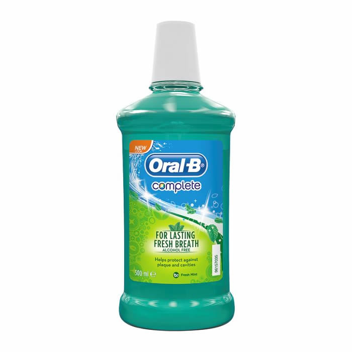 Oral-B Complete Mouthwash Fresh Mint in a 500ml bottle, showcasing a clear bottle with mint-flavored mouthwash.