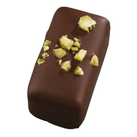 Jag Couture London New York pistachio marzipan in 72% dark chocolate, 12g, with visible pistachio pieces and smooth chocolate coating.
