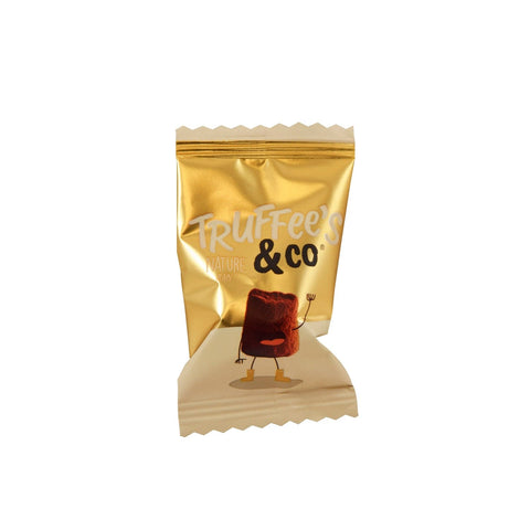 Gold flow-wrapped cocoa dusted French truffles by Jag Couture London New York, approximately 400 pieces in the image.