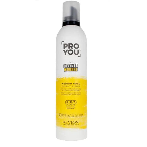 Revlon Proyou The Definer Mousse with medium hold, 400ml, in a bottle held by a hand, showcasing hair styling product from Jag Couture London.