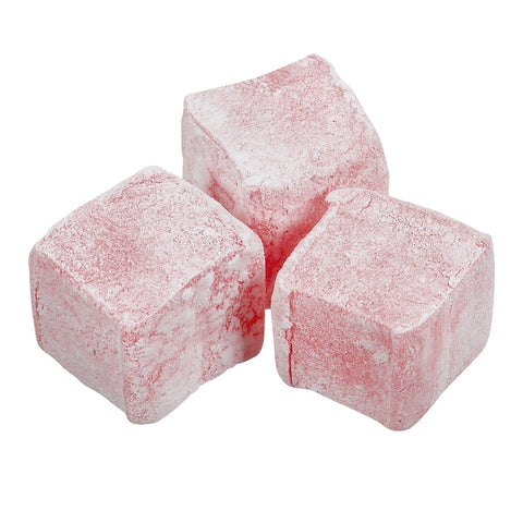 Turkish delight with rose flavor from Jag Couture London New York, close-up of soft, pink, rose-flavored Turkish sweet.