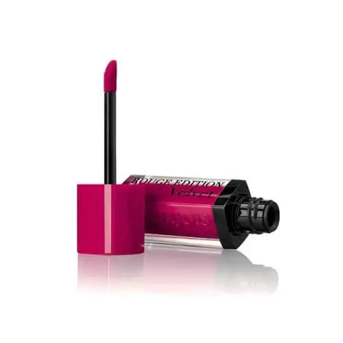 Jag Couture London New York Rouge Edition Velvet 05 Ole Flamingo lipstick in a sleek tube with a vibrant pink shade.