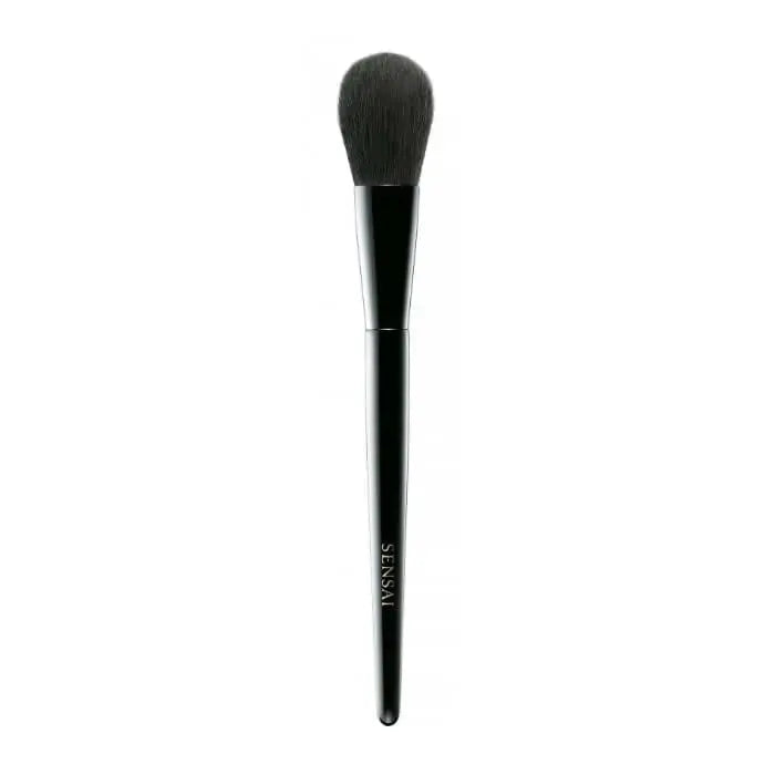 Sensai Cheek Brush by Jag Couture London-New York, with soft bristles and sleek handle for precise blush application.
