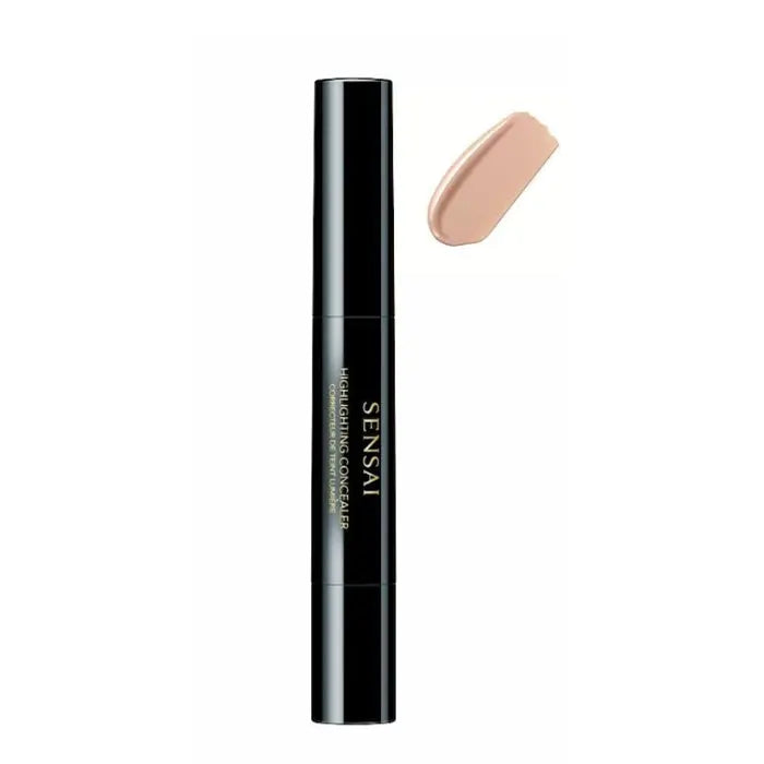 Sensai Highlighting Concealer HC02 Luminous Sand by Jag Couture London-New York, showcasing a sleek tube with luminous finish.