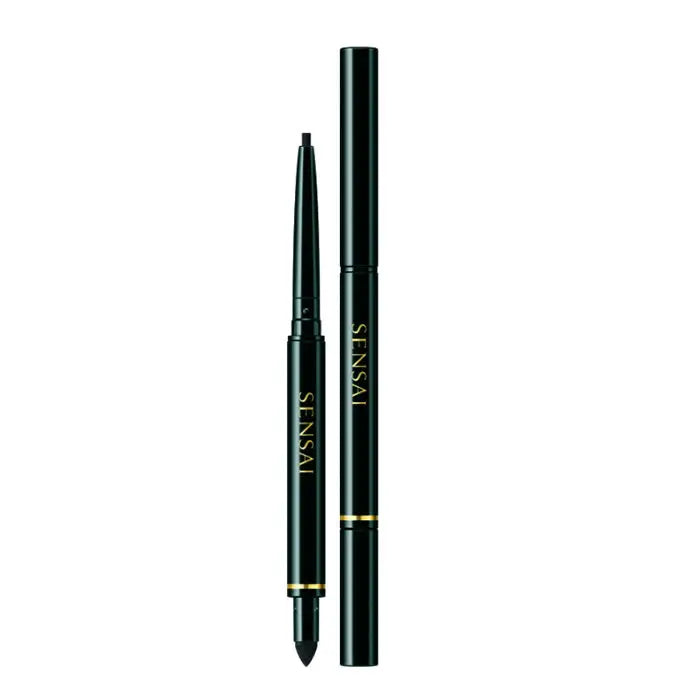 Jag Couture London - New York Sensai Lasting Eyeliner Pencil 01 Black, close-up of the black eyeliner pencil with branding.