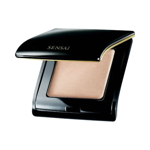Sensai Supreme Illuminator by Jag Couture London-New York, showcasing a sleek makeup highlighter bottle with a shiny cap.