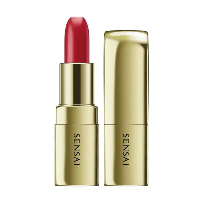 Sensai The Lipstick 01 Sakura Red by Jag Couture London features a vibrant red shade in elegant gold packaging.