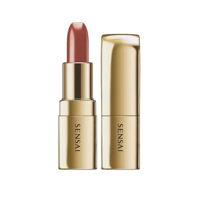 Sensai The Lipstick 15 Kuchinashi Nude by Jag Couture London New York, close-up of the nude lipstick in a sleek tube.