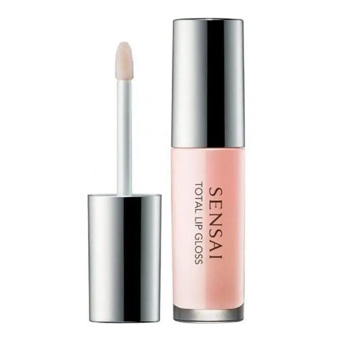 Jag Couture London-New York Sensai Total Lip Gloss in a sleek tube, showcasing a glossy finish and vibrant color.