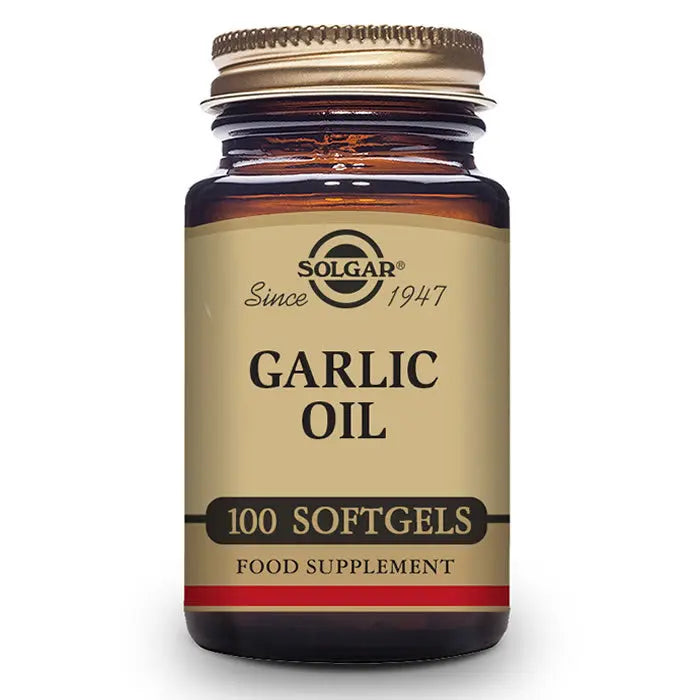 Solgar Garlic Oil softgels in a bottle, dietary supplement by Jag Couture London New York, 100 softgels for health support.