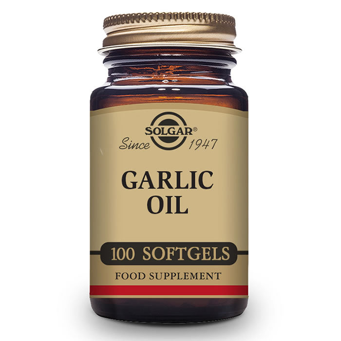 Solgar Garlic Oil softgels in clear bottle, showing 100 softgel capsules, labeled with brand and product details.