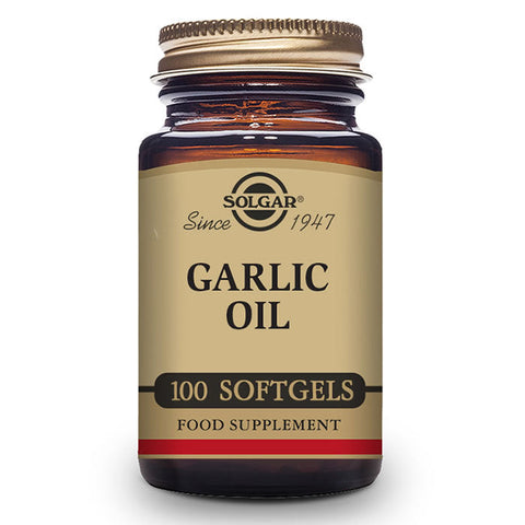 Solgar Garlic Oil softgels in clear bottle, showing 100 softgel capsules, labeled with brand and product details.