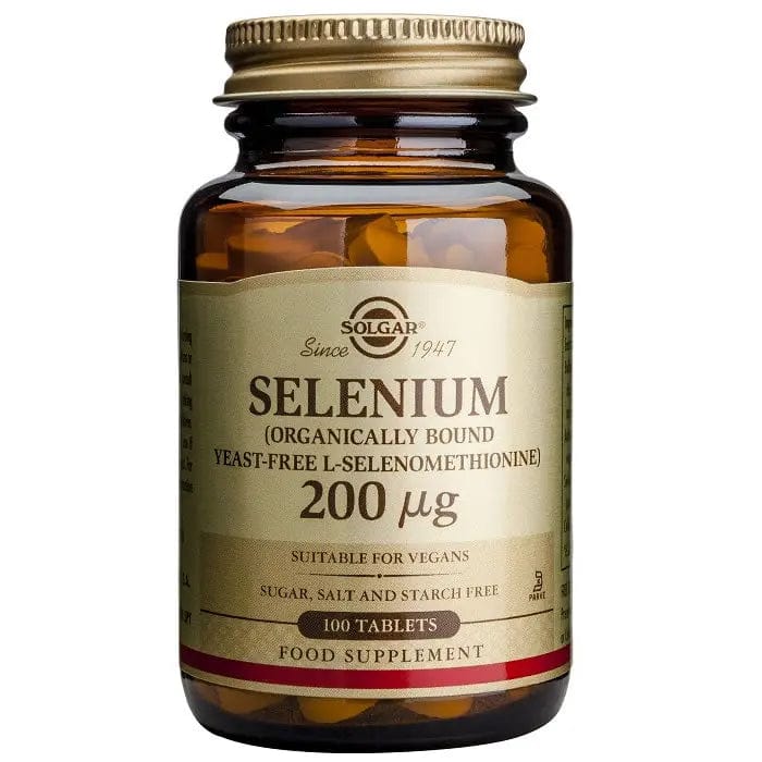 Jar of Solgar Selenium 200µg 50 tablets, dietary supplement by Jag Couture London - New York, with label and tablets visible.