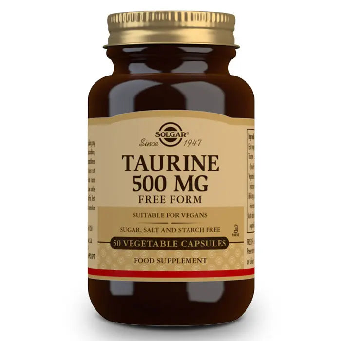Solgar Taurine 500mg capsules in a bottle, supplement by Jag Couture London-New York, showing the product label and capsules.