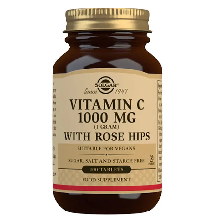 Solgar Vitamin C 1g tablets with rose hip, dietary supplement in a bottle, on a clean background.