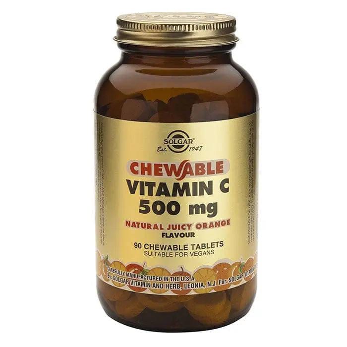 Solgar Vitamin C 500mg orange-flavored tablets in a bottle, displayed with label and tablets visible.