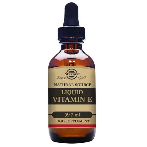 Jag Couture London New York Solgar Vitamin E Liquid 59.2ml bottle with dropper, highlighting its packaging and product details.