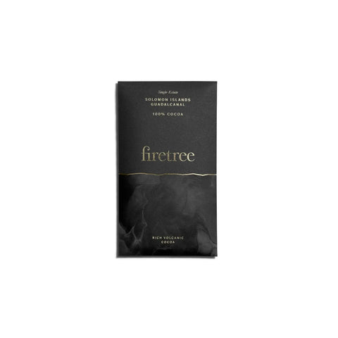 Jag Couture London New York Solomon Islands Guadalcanal 100% rich volcanic dark chocolate bar, wrapped in gold foil with branding.