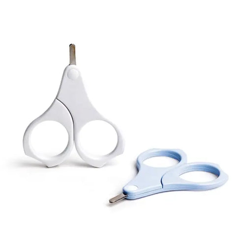 Suavinex children's safety scissors with rounded tips, featuring colorful handles, designed for young kids' craft and grooming activities.