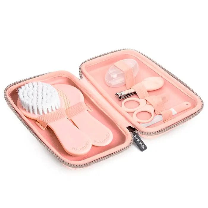 Set of seven pink Suavinex Hygge baby manicure tools from Jag Couture London New York, featuring small scissors and nail files.