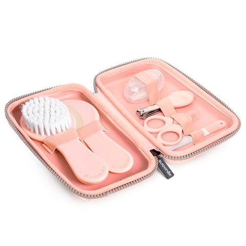 Set of 7 pink baby manicure tools from Suavinex Hygge Baby Manicura collection, featuring safety scissors and nail files.