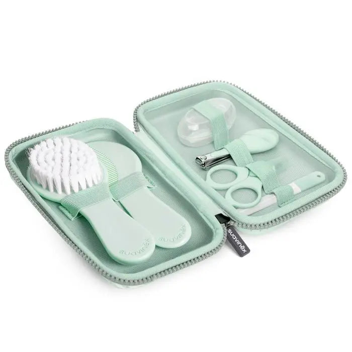 Set of seven Suavinex Hygge baby manicure tools in green, designed for gentle baby nail care, by Jag Couture London New York.