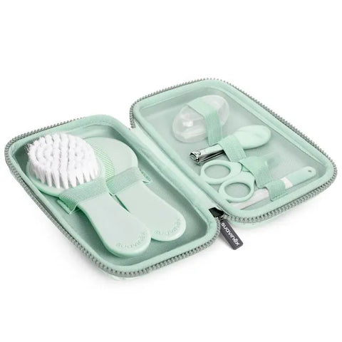 Set of seven green baby manicure tools from Suavinex Hygge collection, perfect for gentle infant nail care.