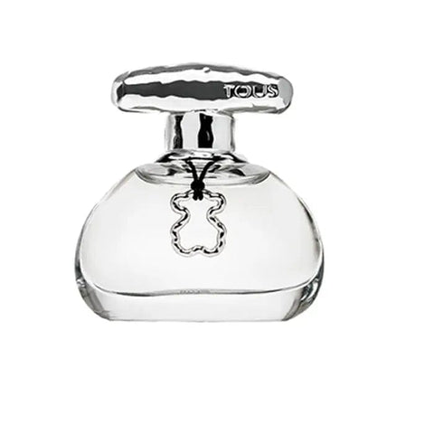 Jag Couture London Tous Touch The Luminous Gold Eau De Toilette spray 100ml, gold-colored bottle with elegant design.