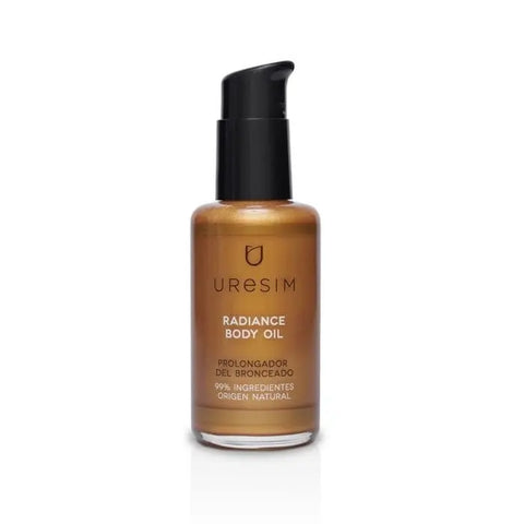 Uresim Radiance Body Oil by Jag Couture London-New York in 100ml bottle, showcasing sleek packaging and golden oil inside.