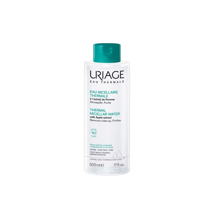 Uriage Eau Micellaire PMG 500ml bottle, gentle skincare product with clear liquid, designed for cleansing and soothing skin.