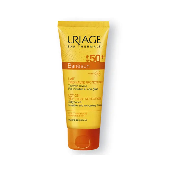 Uriage SPF50+ Extra Fluid Milk in 100ml bottle, hydrating facial sunscreen by Jag Couture London - New York.