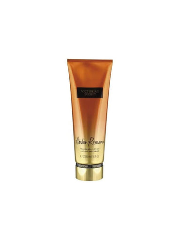 Victoria's Secret Amber Romance Body Lotion by Jag Couture London, 236ml bottle with elegant packaging visible.