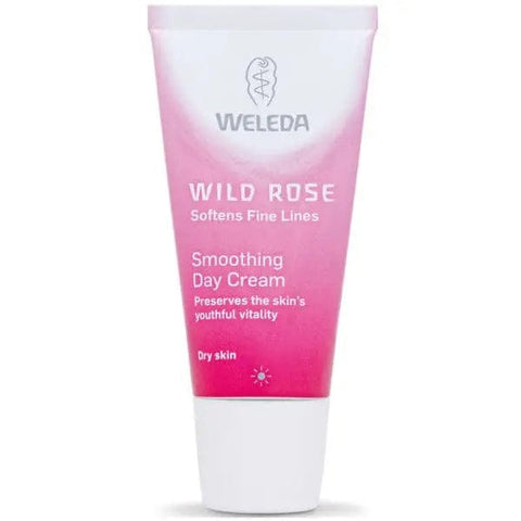 Weleda Wild Rose Smoothing Day Cream in a 30ml jar, featuring a floral design and smooth cream texture for radiant skin.