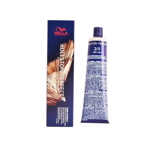 Wella Koleston Perfect Me+ 2/0 Pure Naturals hair color in 60ml bottle, shown in a professional salon setting