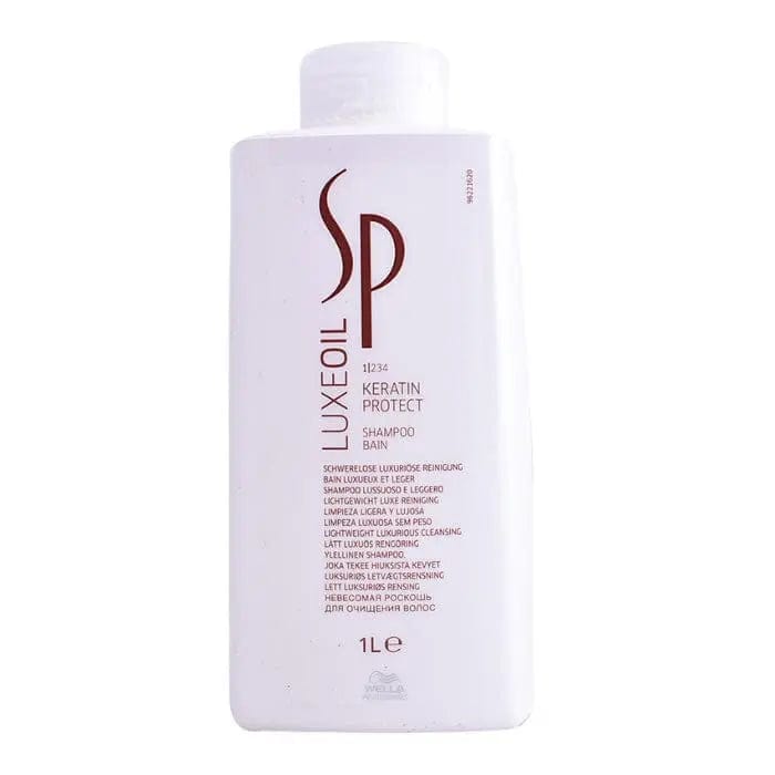 Jag Couture London New York Wella Sp Luxeoil Keratin Protect Shampoo 1000ml bottle with sleek packaging and product label.