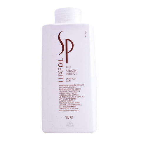 Jag Couture London Wella Sp Luxeoil Keratin Protect Shampoo 1000ml bottle with sleek design and label visible.