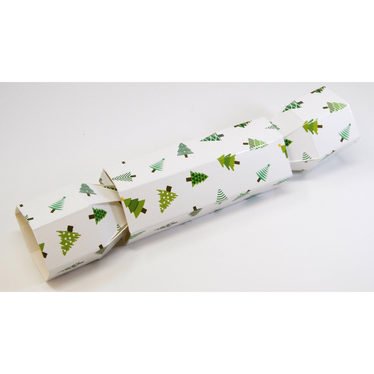 White cracker box with Christmas tree design, 10x4 cm barrel, by Jag Couture London - New York, festive holiday packaging.