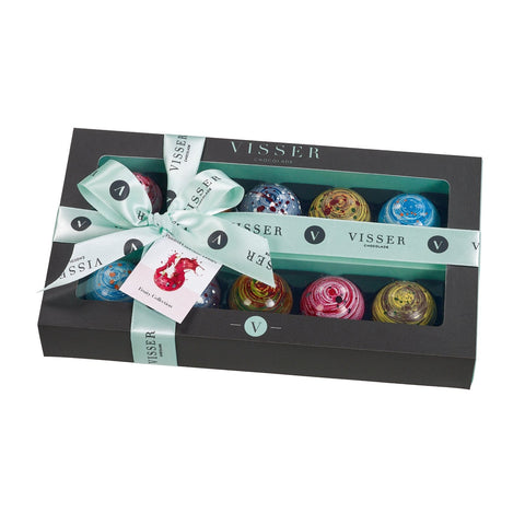 Deluxe gift box of 10 fruity Picasso chocolates by Jag Couture London-New York with menu tag, elegant packaging and colorful chocolates.