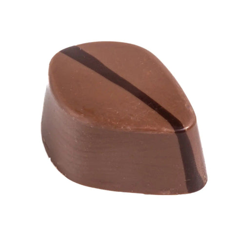Jag Couture London New York Dresse smooth cocoa mousse in milk chocolate 13.5g package, showcasing creamy chocolate dessert.