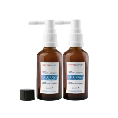 Ducray Neoptide Expert Serum for hair loss and growth, 2x50ml bottles, shown in a sleek packaging with a dropper applicator.